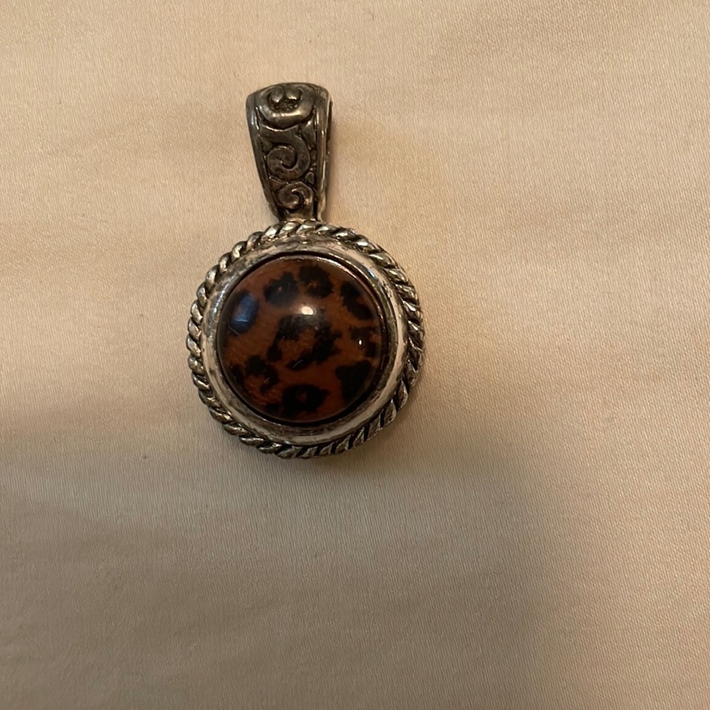Animal print stone pendant